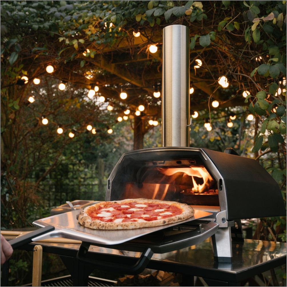 https://joesbbqs.com.au/cdn/shop/products/Ooni-Karu-16-in-use-l_1024x1024_2x_28cf13c9-c857-4b3c-969f-630f173e5533.jpg?v=1667443195